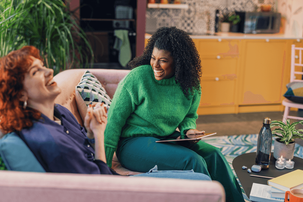 close up of two girls discussing project