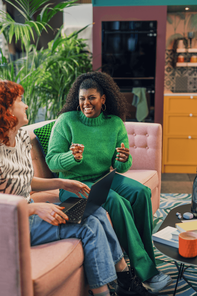 two girls discussing project